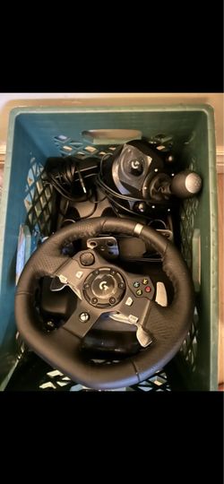 Logitech steering wheel with shifter.