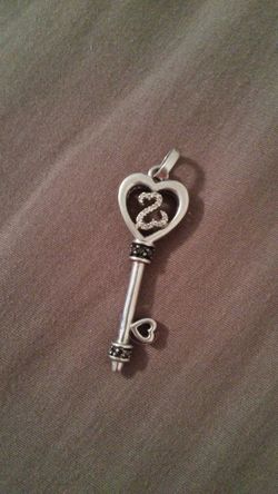 Sterling silver diamond open heart charm