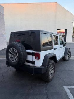 Jeep wrangler unlimited rubicon white 4x4 off road awd grand Cherokee Chevy Tahoe blazer k5 ford bronco explorer expedition dodge durango gmc Yukon To