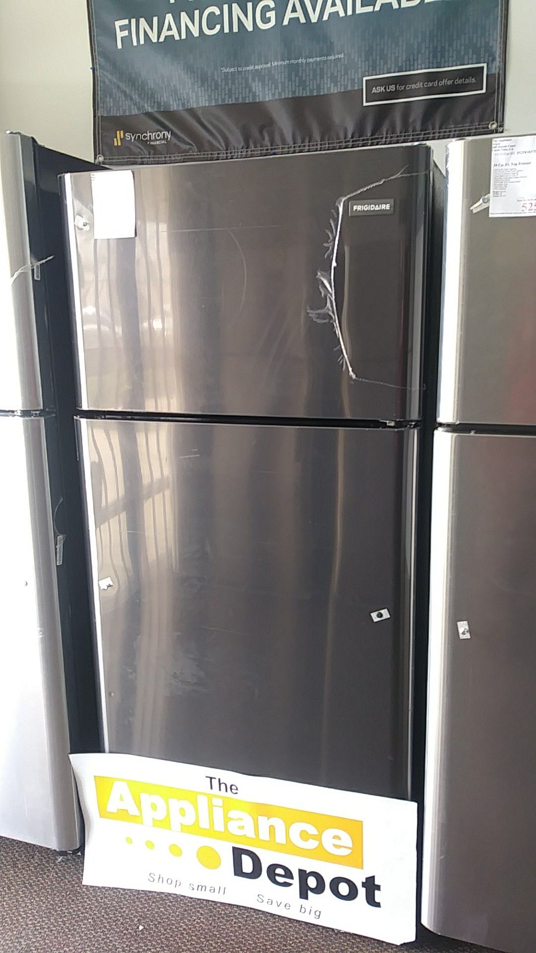 New Frigidaire Top Freezer in black stainless