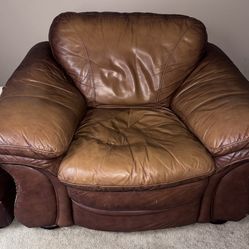 Pair of Leather Chairs and Ottomans