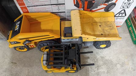 Outdoor Tonka and Cat Toy Trucks