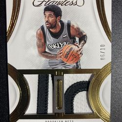 Kyrie Irving 2021-22 Panini Flawless Dual Gold Game Worn/Used Patch. Very limited Print /10. Card is in Mint condition.