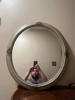 Vintage brushed nickel oval beveled mirror with matte yellow gold accents by Stanley Works