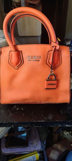 Little orange guest purse handbag or shoulder bag does come with a strap