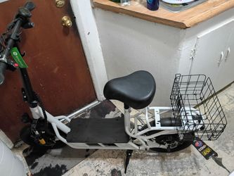 Electric scooter with seat