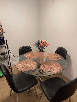 Round 4-seat glass table with all 4 chairs