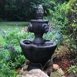 Outdoor Water Fountain New in Original Packaging With 2 Tiers and Ornate Lion Heads.