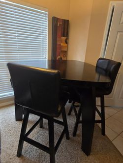 Brand new 54 inch dining room table  with swivel barstool and 2 chairs