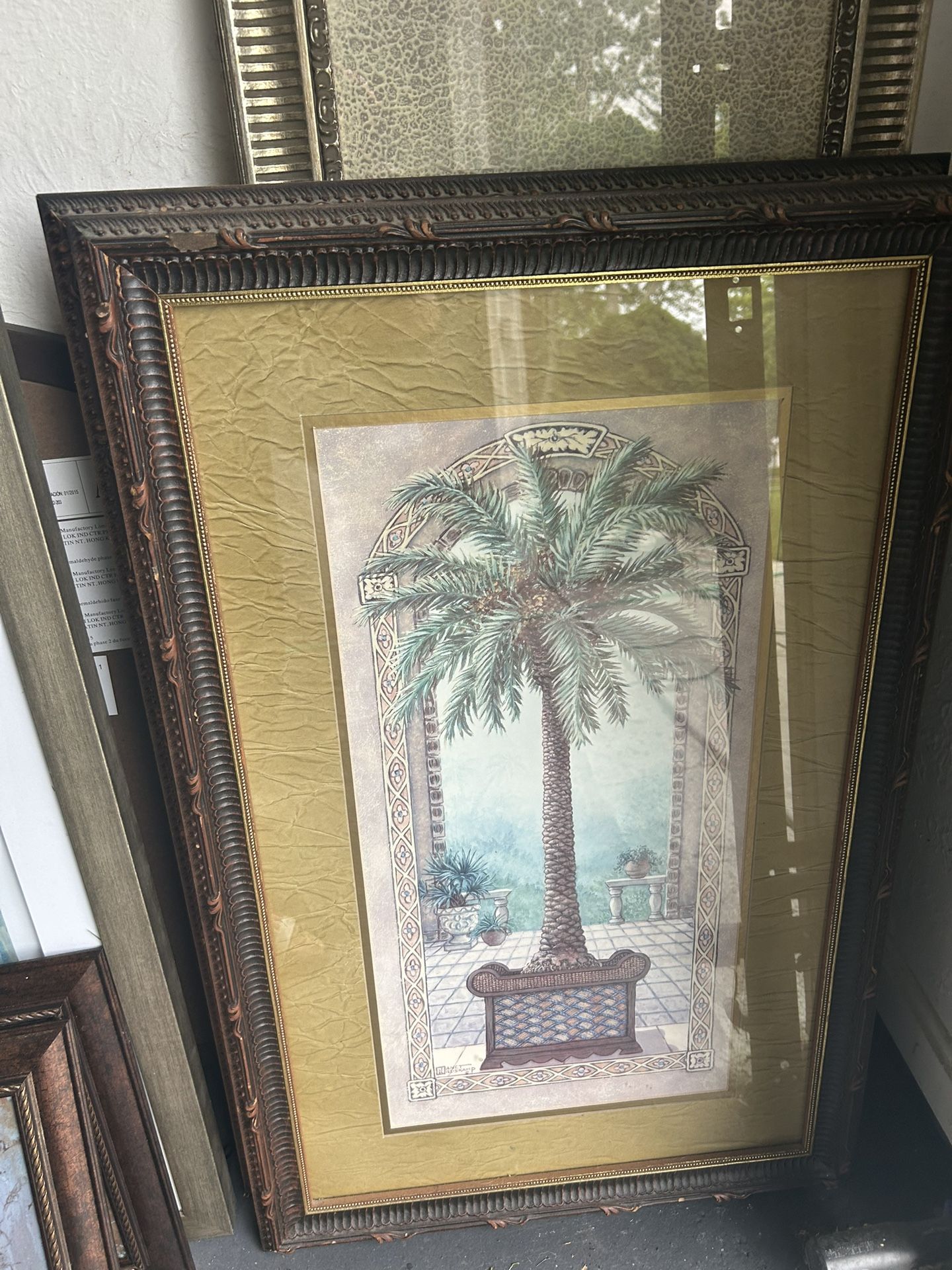 Double Set Of Janet Kruskamp presents a stunning 18x32 Gold Ornate Wood Framed With Double Matting Wall Art piece, entitled "Palm Tree in Basket I".