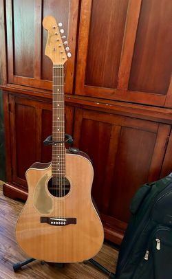 Left handed acoustic/electric Fender guitar and accessories