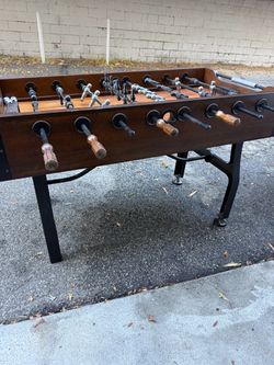 Foosball Table with Wood and Metal Handles great condition