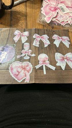 Pink bow hanging swirls