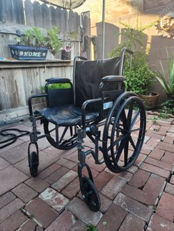 Black Manual Wheelchair with Fold-Down Arms