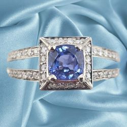 Palladium ring with 1.03ct cushion cut sapphire and 0.50ctw diamonds.