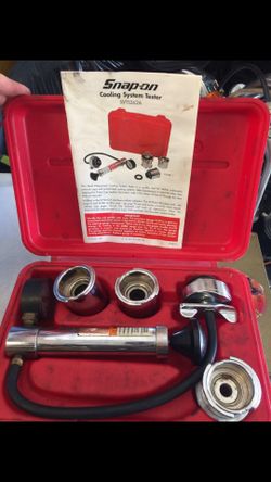 Snap on cooling system tester