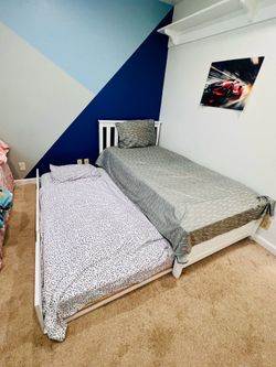 White Twin Bed with Pull-Out Trundle with mattresses