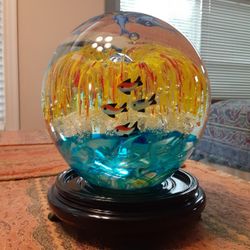 ORIENTAL DECOR A LARGE SOLID GLASS GLOBE WITH  ROSE WOOD ROUND STAND 