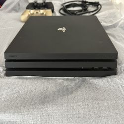 PS4 Pro Black W/2 Games