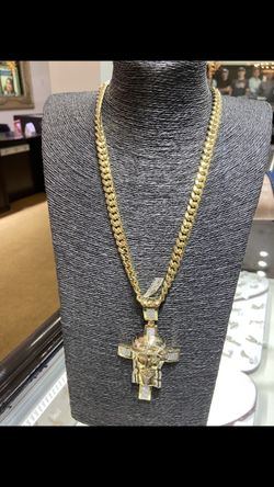 10k gold Miami Cuban chain with diamond Jesus head.