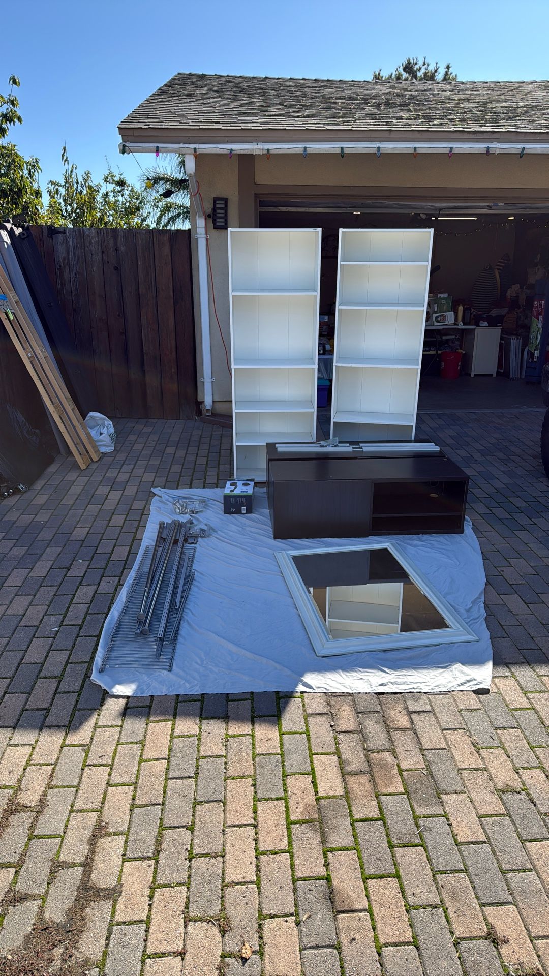 Two Bookshelves, Floating Tv Stand, Front Door Handle, Sliding Glass Shower Door, Closet Shelves