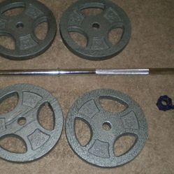Weights 217 lbs with bar and clamps & 8 25 lb plates New Condition 