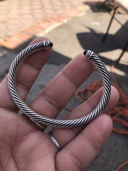 Sliver bracelet with black diamond stones and white diamonds