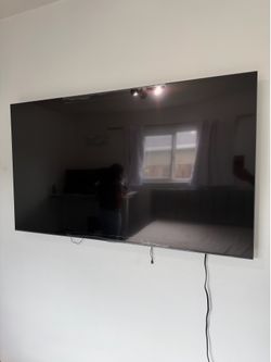 TU7000 60” TV with Remote in Original Box