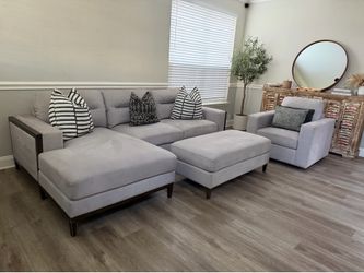 Light gray sectional, ottoman, & chair