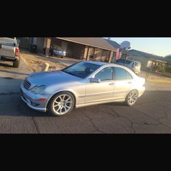 Mercedes Benz C230 And BMW 