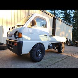 Suzuki 4x4 Mini Truck  JDM Registered And Titled Side By Side Or At