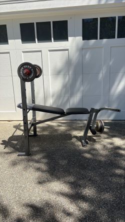 Weight Bench with weights and curl bar
