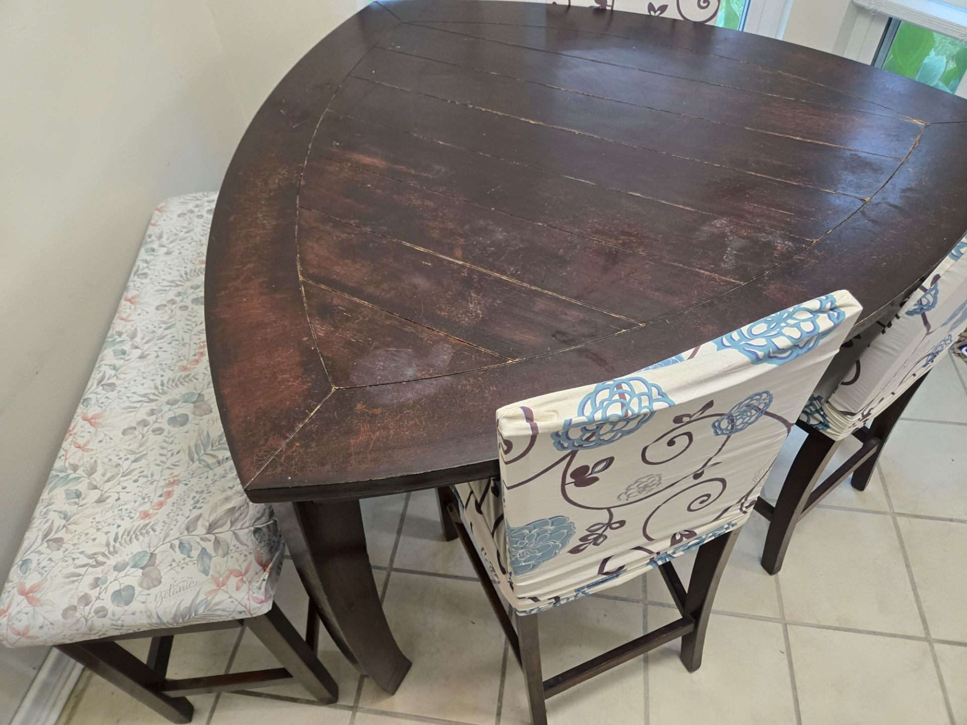 Breakfast table set with seat covers.