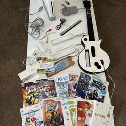 Ultimate Nintendo Wii Bundle!! Guitar Hero Guitar + 3 Controllers +Nunchucks + 12 Games