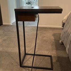 Side table with charging station.