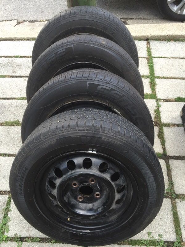 4 Black Steely rims. P185/65R14. From a 03 Honda Civic.