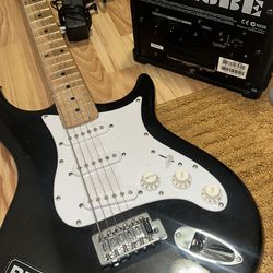 Electric Guitar + Roland Micro Cube Amp