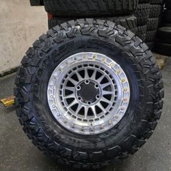 17" LOCK  rims w- 35" TOYO RT Trail.  $2300