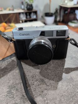 Canon canonet camera lens and cover