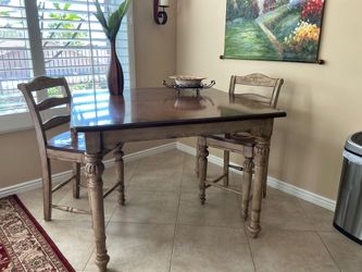 Table and chairs with 1 leaflet