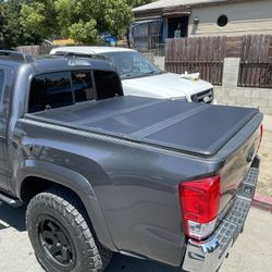 05-25 Toyota Tacoma 5ft Hard Tri Fold Bed Cover