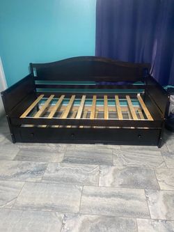 Twin bed frame with trundle