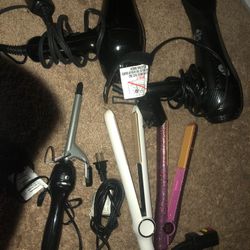 1 curling iron, 2 dryers and two hair straighteners,