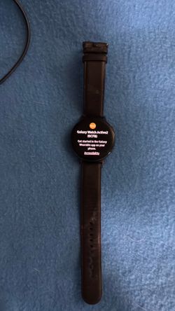 Samsung galaxy watch with 2 chargers