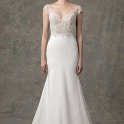 Designer, hand-beaded Enaura Bridal wedding gown