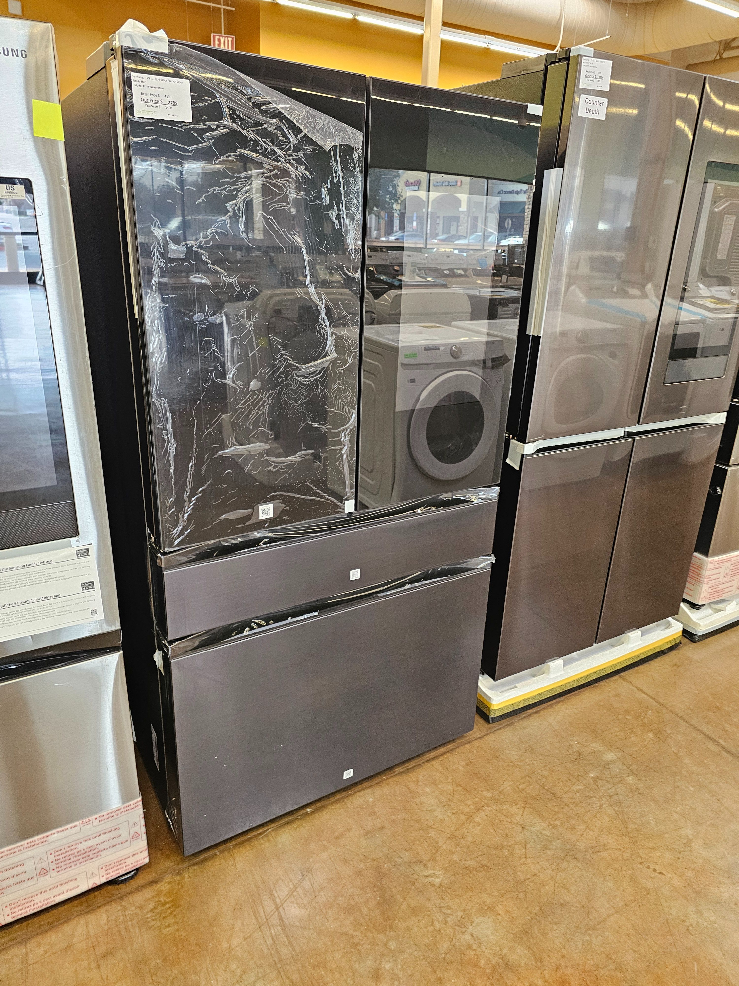 Black stainless steel refrigerator Samsung Bespoke 36 inch wide
