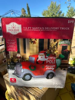 Santa’s delivery truck inflatable Christmas decoration