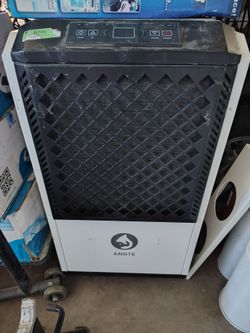 This is an ANDTE 250 Pints Commercial Dehumidifier, a high-capacity unit designed for large spaces up to 4,500 square feet.