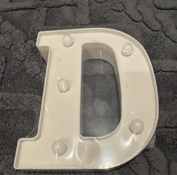 Letter D lights up