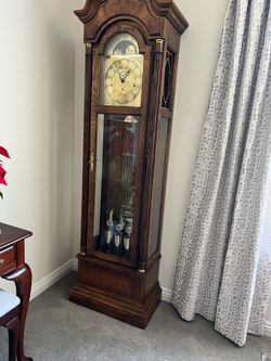 Howard Miller Man and Moon Time Clock